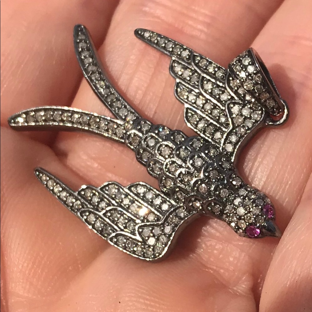 Incredible Diamond ruby eyed Swallow bird pendent.